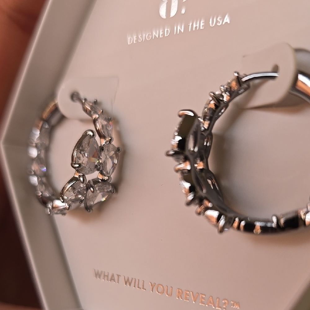 Bomb Party Pure Speechless. Intricate Silver Hoop Earrings with Openwork Design